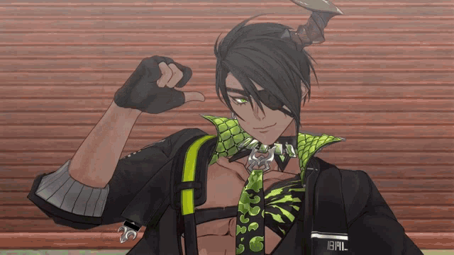 a man wearing a black jacket and a green tie has the letters bal on his chest