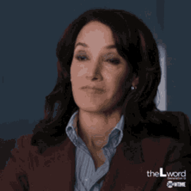a woman says i 'm not buying while wearing a suit