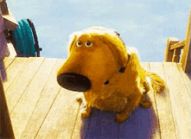 a cartoon dog sitting on a wooden deck looking up