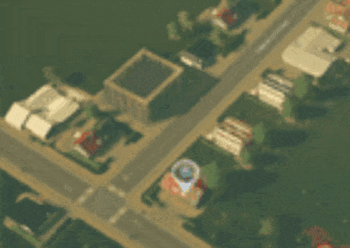 an aerial view of a residential area with a few buildings and trees