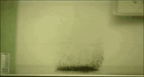 a close up of a wall with a few spots of stains on it