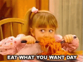 a little girl is eating spaghetti with the words eat what you want day written below her