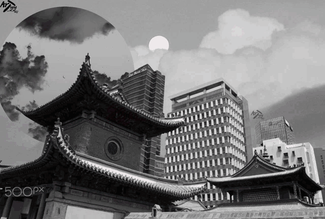 a black and white photo of a building with 500px written on the bottom right