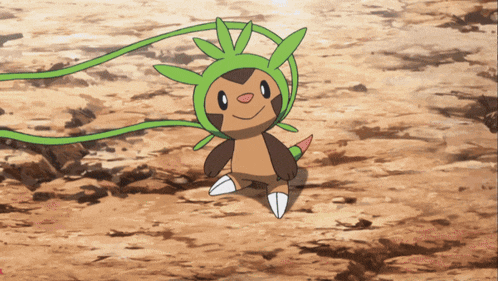 a cartoon character with a green hat and leaves on its head