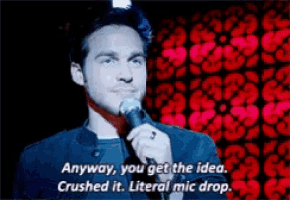 a man speaking into a microphone with the words " anyway you get the idea crushed it literal mic drop "
