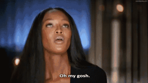 a woman with long black hair is talking and says oh my gosh .
