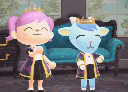 two cartoon characters wearing crowns are standing in front of a blue couch