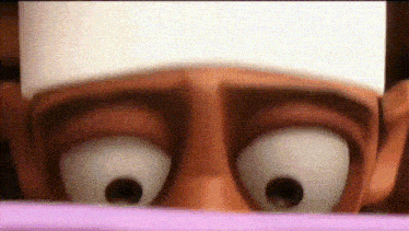 a close up of a cartoon character 's eyes and face
