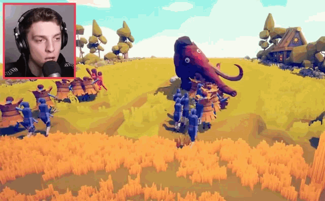 a man wearing headphones is playing a video game with a giant mammoth in the background