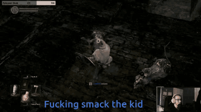 a man playing a video game with the words fucking smack the kid