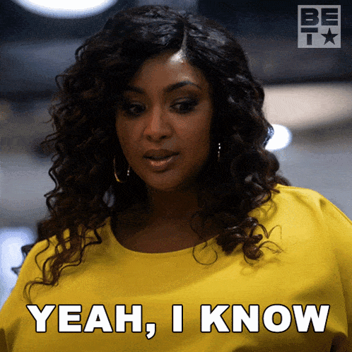 a woman in a yellow shirt says yeah , i know