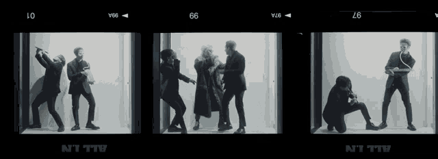 a group of people standing in a room with the number 66 on the bottom right