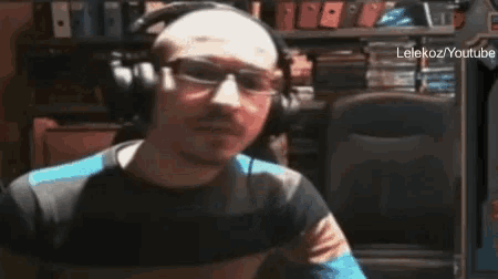 a blurred image of a person 's head with the words lelekoz / youtube visible
