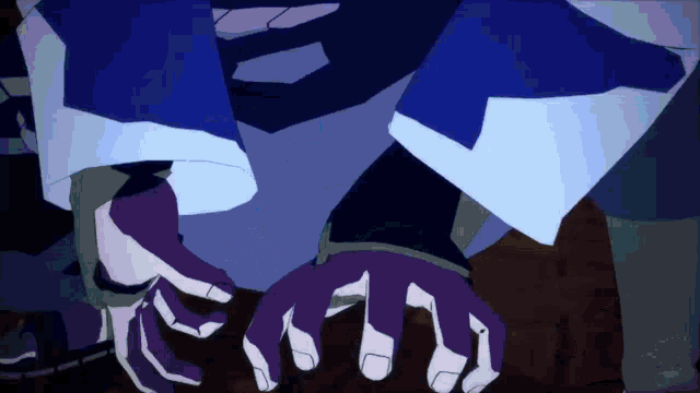 a close up of a person 's hands with purple gloves