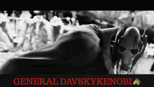 a black and white photo of a general davskykenobi laying down