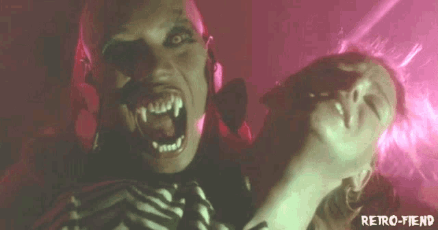 a picture of a vampire and a woman with retro-fiend written below it
