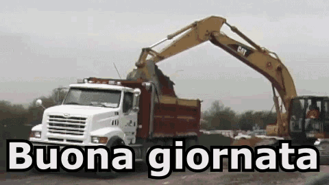 a cat excavator is loading dirt into a dump truck with the words buona giornata below it