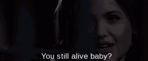 a woman is asking if she is still alive in a dark room