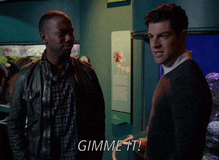 two men are standing next to each other with the words gimme it written on the screen