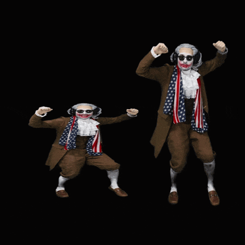 two men dressed in patriotic costumes are dancing with their hands in the air