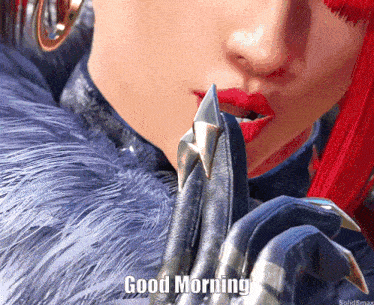 a close up of a woman 's face with the words good morning above her