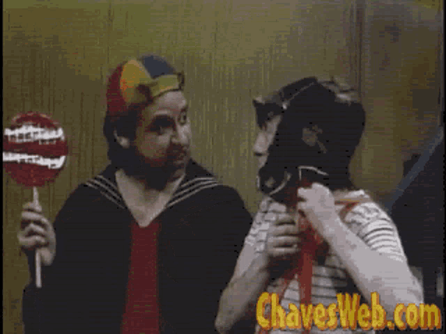 a picture of two cartoon characters with the website chavesweb.com in the bottom right corner