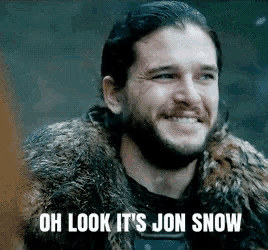 a man wearing a fur coat with the words oh look it 's jon snow on it