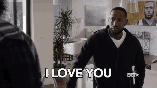 a man says i love you while standing in a living room