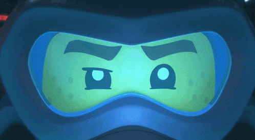 a close up of a ninjago character 's face with glowing goggles