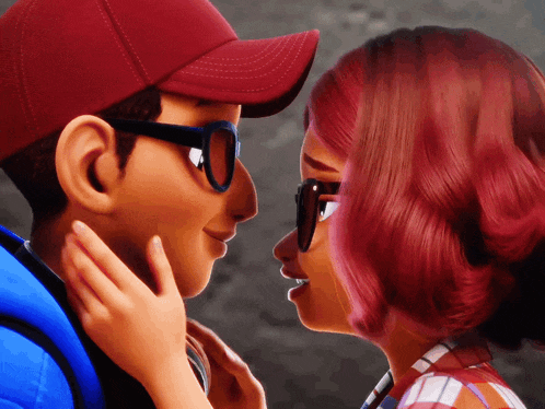 a man and a woman are looking at each other and the woman has red hair