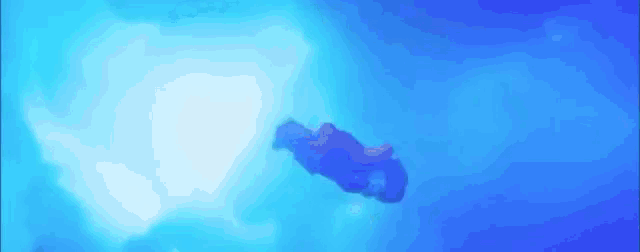 a person is flying through the air in a blue background