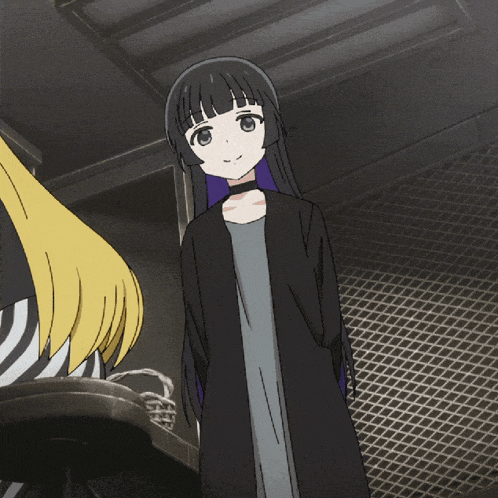 a girl with long black hair is wearing a black jacket