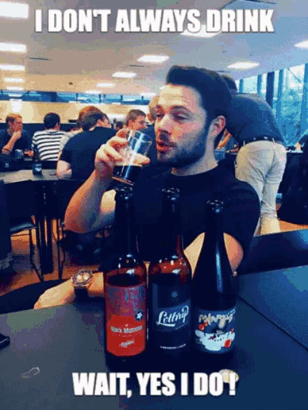 a man sitting at a table with three bottles of beer and the caption " i don t always drink "