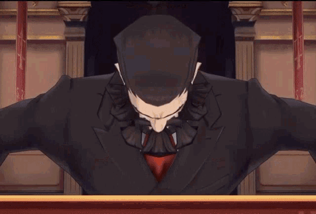 a man with a beard is sitting on a throne in a courtroom .