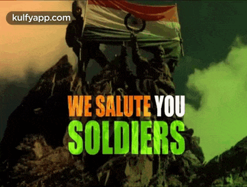 a group of soldiers standing on top of a mountain holding a flag .
