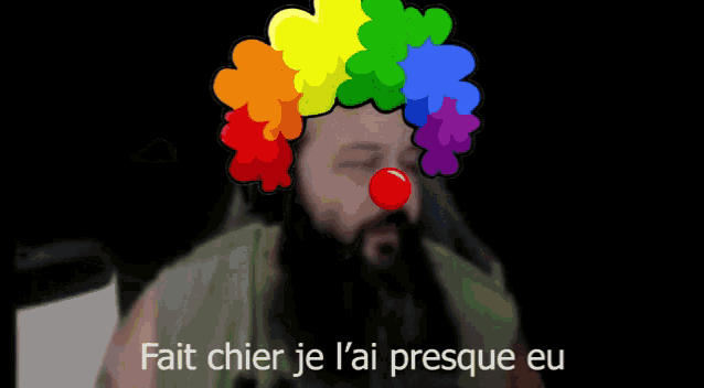 a man wearing a clown wig with the words mais st 'un asti de cancer written below him