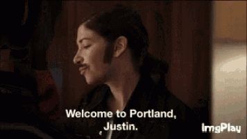 a man says welcome to portland justin while looking at another man