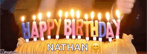 a birthday cake with the name nathan written on it