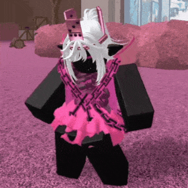 a girl in a pink dress with chains around her waist