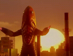 a monster is standing in front of a sunset over a city .