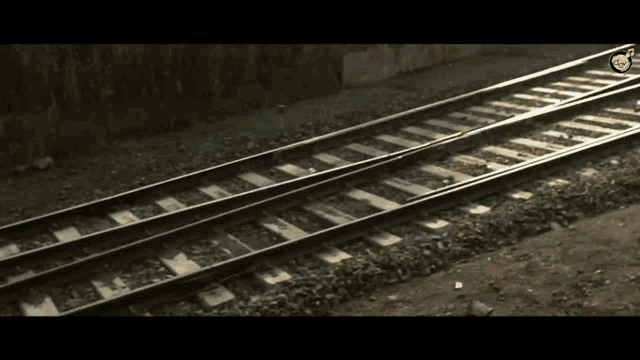 a train track with a few tracks that are very narrow