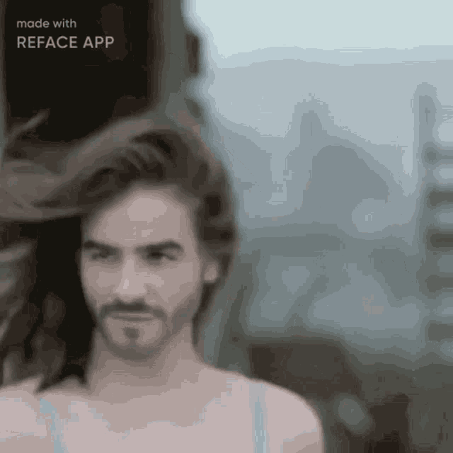 a man with long hair and a beard is being made with reface app
