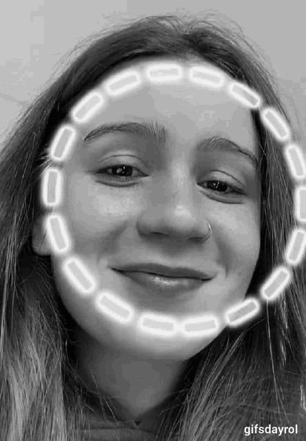 a black and white photo of a woman with a circle around her face and the words gifsdayrol at the bottom