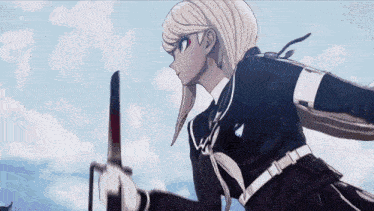 a girl is holding a bloody knife in her hand .