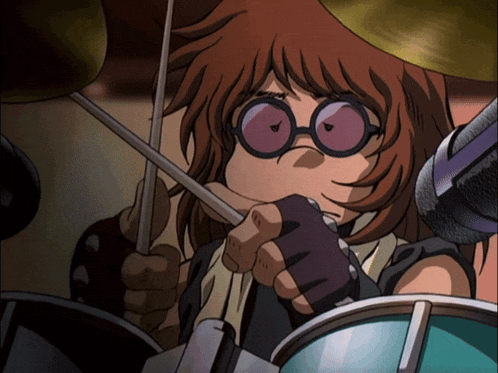 a girl with glasses is playing drums in a band