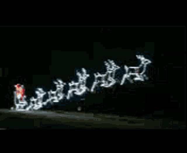 a christmas sleigh is being pulled by a reindeer in the dark .
