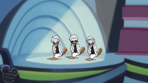 three cartoon ducks are dancing on a stage with a disney logo in the corner