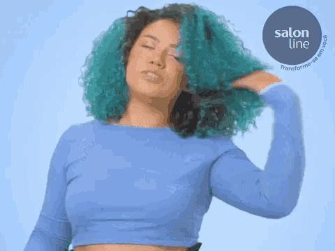 a woman with blue hair is holding her hair in front of a salon line logo