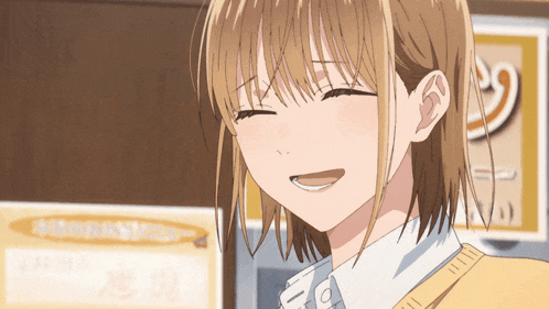a girl in a yellow sweater is smiling in front of a sign that says " special "