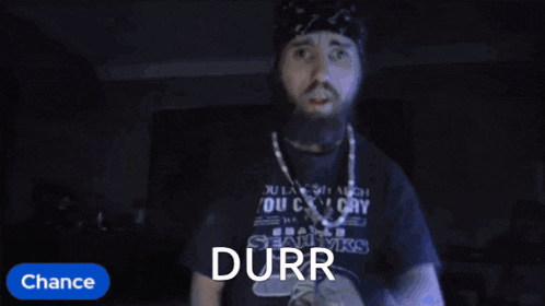 a blurry picture of a man with the word durr written on it